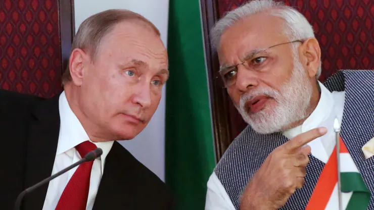 Russian President Vladimir Putin speaking to Indian Prime Minister Narendra Modi