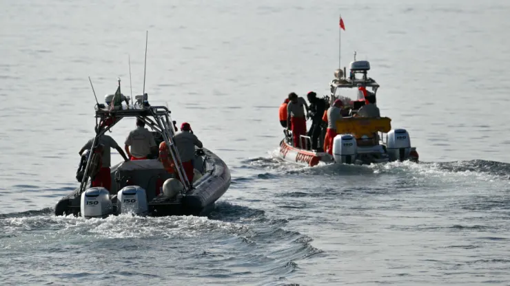 Divers of the Vigili del Fuoco, the Italian Corps. of Firefighters leave Porticello harbor near Palermo, to resume research for a last missing person on August 23, 2024, four days after the British-flagged luxury yacht Bayesian sank.